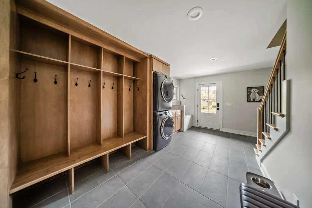 Wood built-in mudroom bench and storage cubbies in Cowdin’s Edenderry home transformation