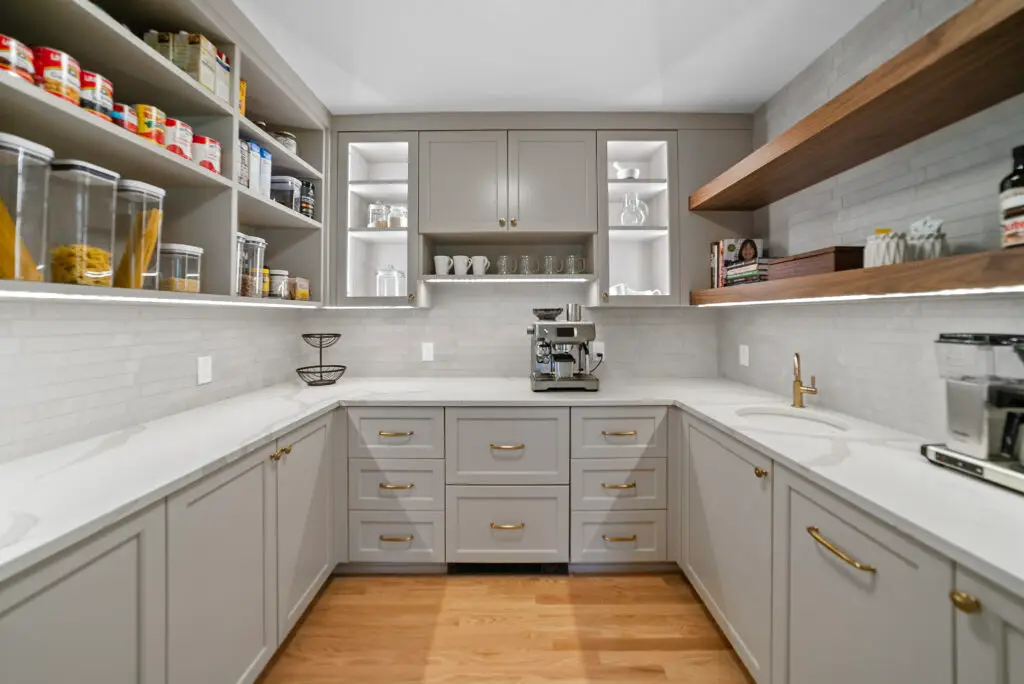 Pantry cabinetry and wood shelving in Cowdin’s Edenderry home transformation in Northville